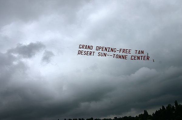 Grand Opening - free tan Desert Sun - - Towne Center